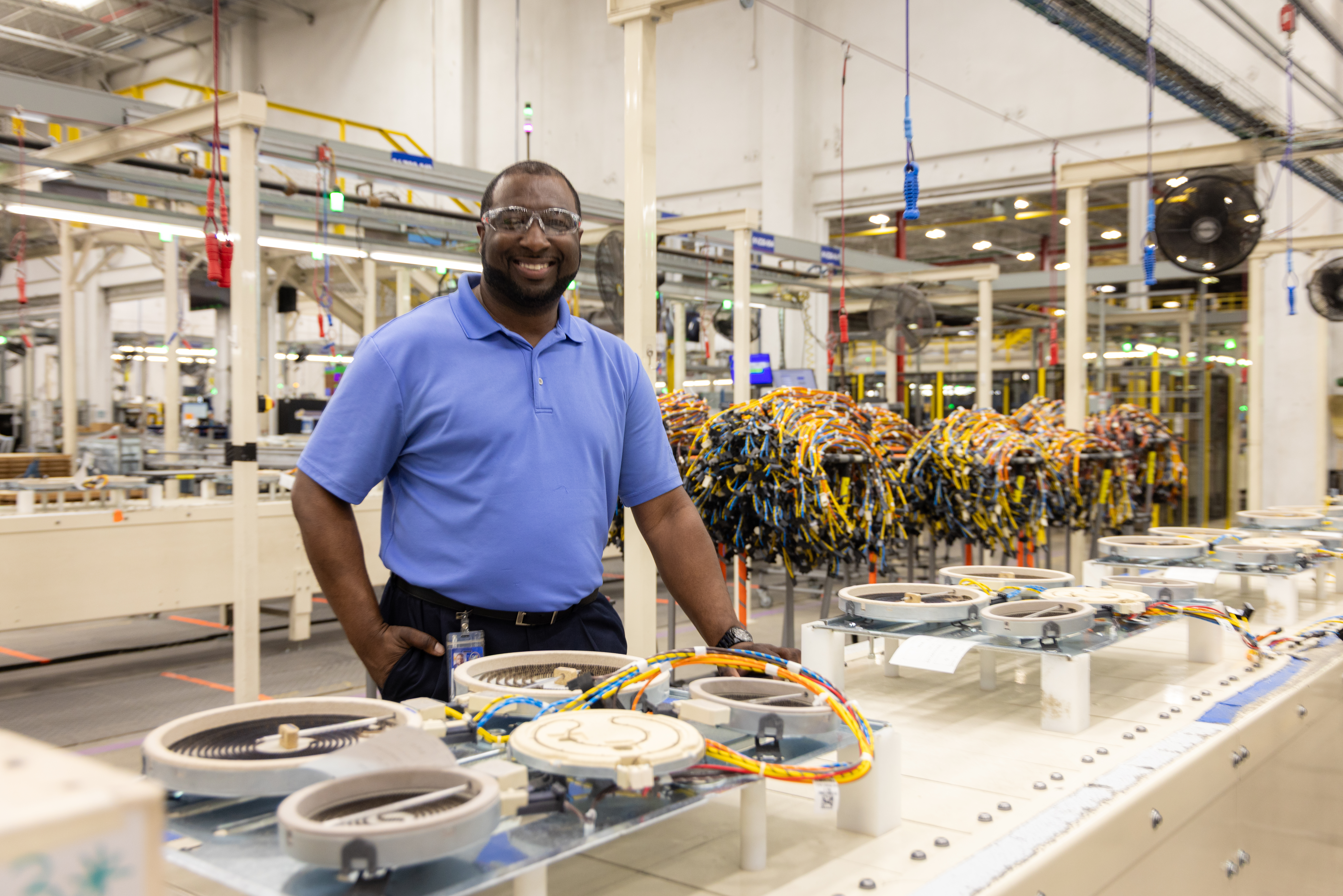 Luther Ingram stands in Roper Corporate plant